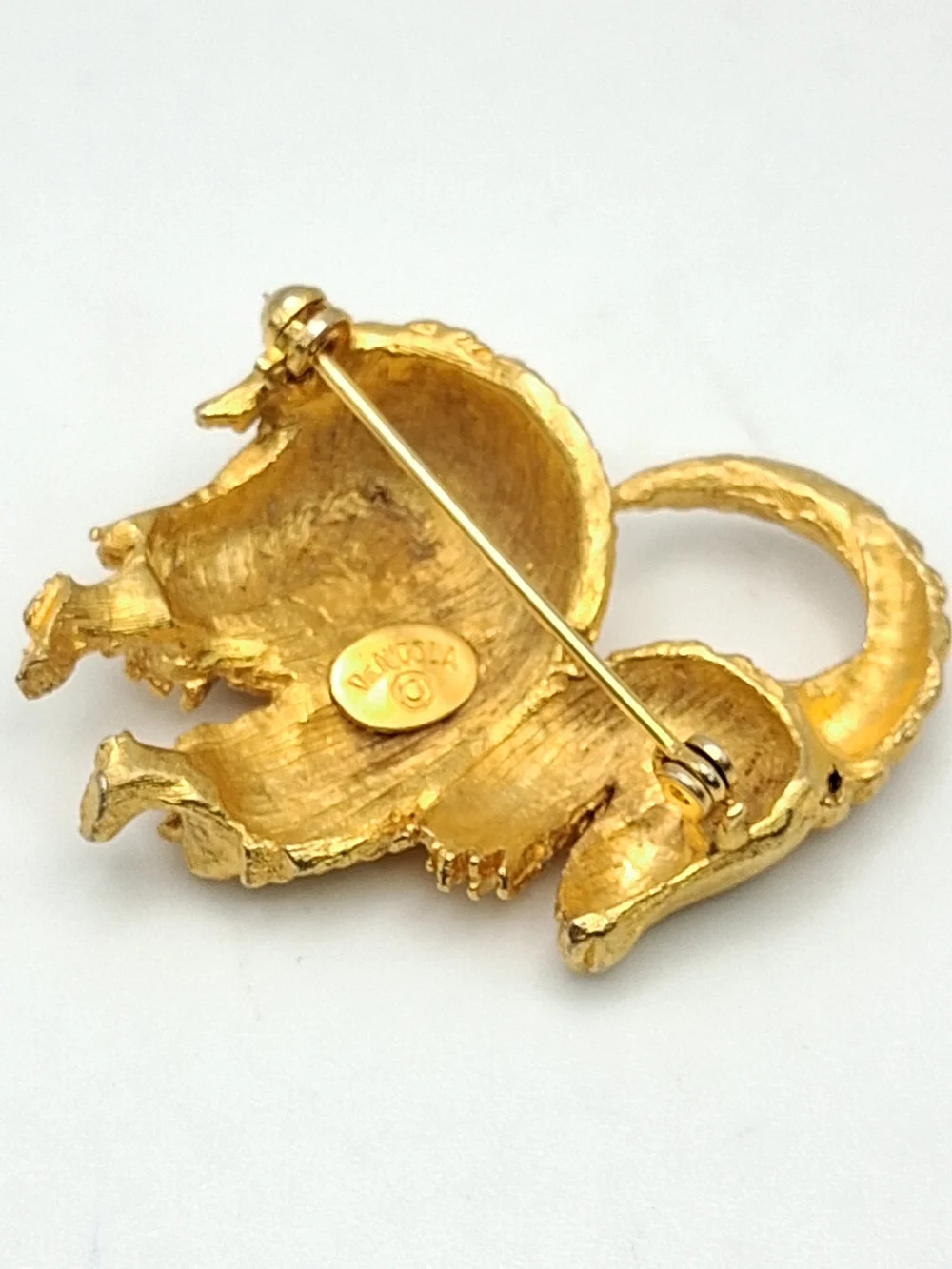 PM4. Gold Tone Ram Brooch with Teal Eye
